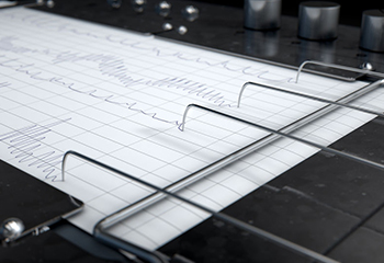 A polygraph examination being conducted with a lie detector machine.