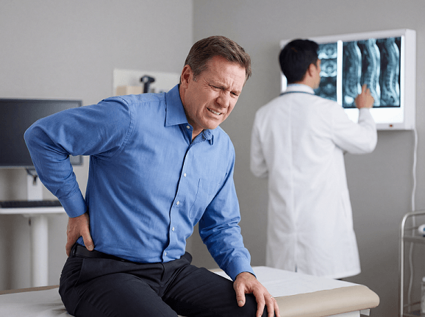 Top Fraudulent Injury Claim Warning Signs employee in doctor office No Evidence of severe pain